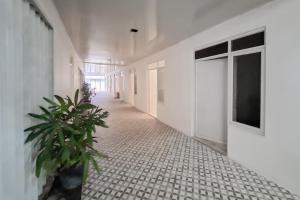 RedDoorz at Grand Mirza Near Pasar Grosir Batik Setono Pekalongan