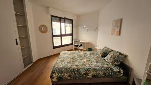 Appartements Le Valentina - Chambres au pied du lac et du metro : photos des chambres