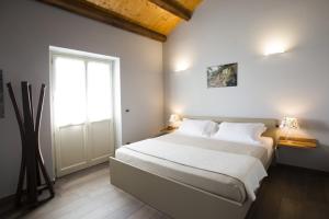Camera Matrimoniale Deluxe (2 Adulti + 1 Bambino)