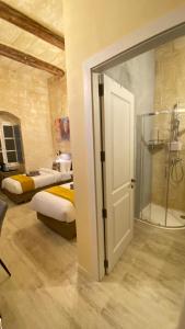 Ancient Maltese House with modern interior 3 min away from Airport TAL-PINU