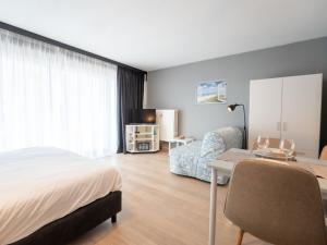 Studio Blue Sand I with lateral sea view by Interhome