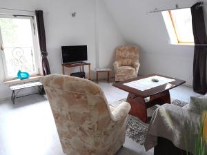 Three-Bedroom Apartment room in Ferienwohnung Marion Franke