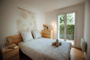 Appartements Lumineux appartement avec terrasse proche de Geneve : photos des chambres