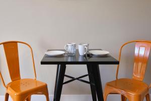Appartements Au Celadon Parking gratuit, WIFI, Terrasse, Piscine : photos des chambres