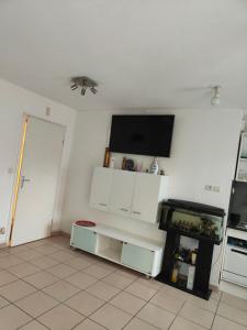 Appartements Studio avec piscine jardin : photos des chambres