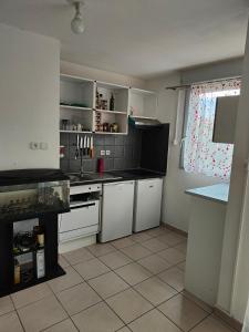 Appartements Studio avec piscine jardin : photos des chambres