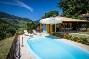 Casa ampla c piscina e churrasq em meio a natureza - 马卡埃