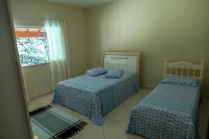 Casa ampla c piscina e churrasq em meio a natureza