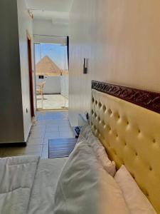 Isis Pyramids and sphinx view