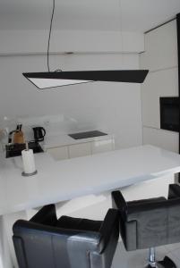 Biały Apartament Szyperska 23 z przestronnym tarasem