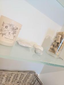 Appartements Le Central - Vue Place Jeanne Hachette : photos des chambres