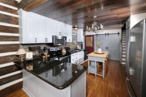 STUNNING 5BR pet-friendly home with game rooms, 2 kitchens, & perfect style!