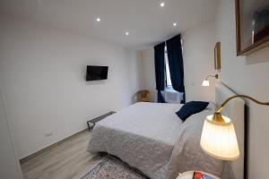 SweetHome Confortevole bilocale vicino Stazione Aria Condizionata Wifi