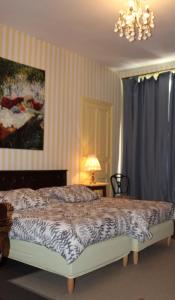 B&B / Chambres d'hotes Chambres d'hotes La Distillerie B&B : Suite 2 Chambres