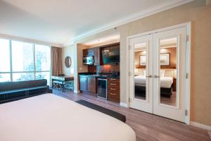 No Resort Fee Strip View Suite + Free Valet + Pool