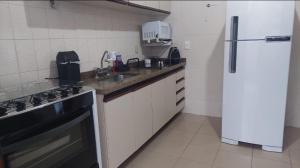 Casa no módulo 3 da Riviera de São Lourenço com churrasqueira e piscina privativas, 300m da praia