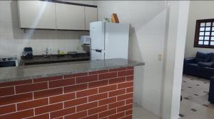 Casa no módulo 3 da Riviera de São Lourenço com churrasqueira e piscina privativas, 300m da praia