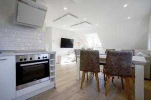 Sonnenglück - Helle und moderne Ferienwohnung am Meer