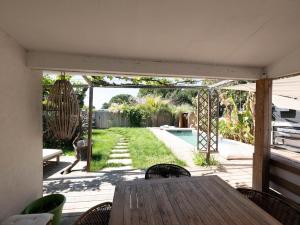 Villas Maison de la Bonaventure Perols, piscine et jardin : photos des chambres