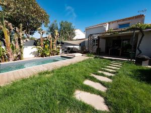 Villas Maison de la Bonaventure Perols, piscine et jardin : photos des chambres