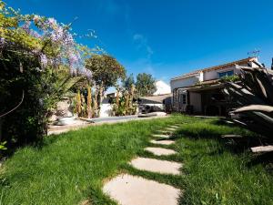 Villas Maison de la Bonaventure Perols, piscine et jardin : photos des chambres