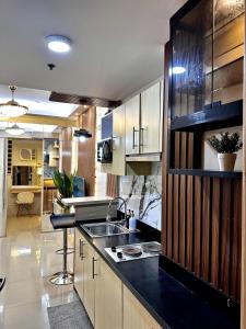 Homey staycation in Grass Residences - 3-звездочные отели в городе Манила