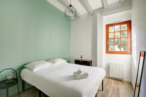 Appartements La cabane - A l Ombre des vieilles poutres : photos des chambres
