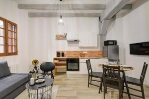Appartements La cabane - A l Ombre des vieilles poutres : photos des chambres
