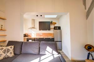 Appartements La cabane - A l Ombre des vieilles poutres : photos des chambres