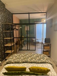 Appartements Le Loft CITY, au coeur du village : photos des chambres