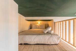 Appartements Studio pour deux personnes en mezzanine : photos des chambres