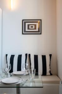 Appartements Studio pour deux personnes en mezzanine : photos des chambres