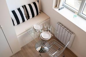 Appartements Studio pour deux personnes en mezzanine : photos des chambres