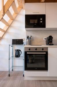 Appartements Studio pour deux en mezzanine avec petit balcon : photos des chambres