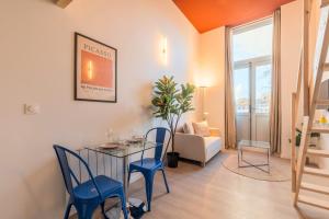 Appartements Studio pour deux en mezzanine avec petit balcon : photos des chambres