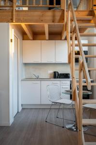 Appartements Grand studio pour deux personnes en mezzanine : photos des chambres