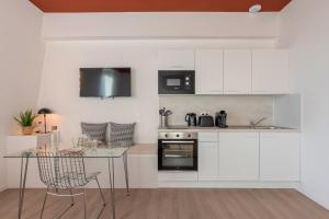 Studio équipé côté cour, parking gratuit