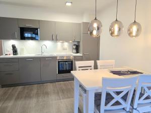 Dünenpark Binz - Komfortplus Ferienwohnung mit 1 Schlafzimmer und Balkon im Obergeschoss 204