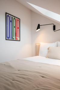 Studio sous les combles côté rue, parking gratuit