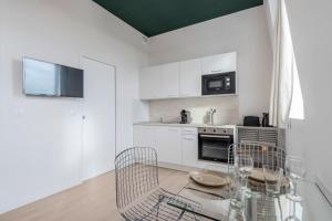 Appartements Studio equipe avec parking gratuit : photos des chambres