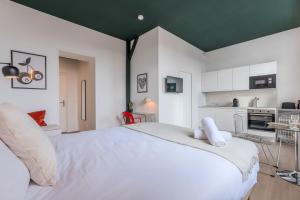 Appartements Studio equipe avec parking gratuit : photos des chambres