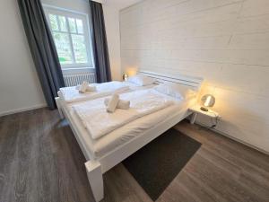Dünenpark Binz - Komfortplus Ferienwohnung mit 1 Schlafzimmer und Balkon im Obergeschoss 204