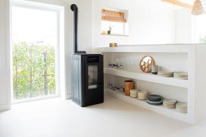 By Tons Huisje inclusief twee fietsen