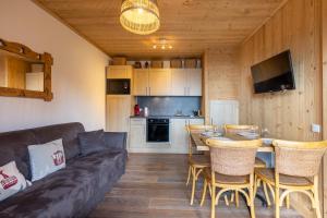 Appartements Les Cariolettes - Vue montagne et jardin : photos des chambres
