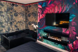 Appartements Love Room - Balneo - Nuit Insolite - Intimite : photos des chambres