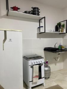 Flat elegante e bem localizado