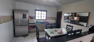 Casa com piscina próxima a praia