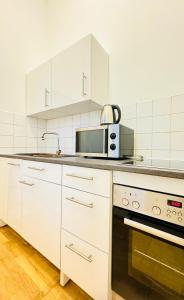Comfy 1BR Apt for 4, 10Min Transport to Stadthalle
