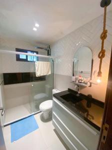 Quarto e sala com piscina em Maceió - Villas Tulipa 02