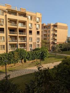 Madinaty Cozy 2 bedrooms narrow garden view apartment